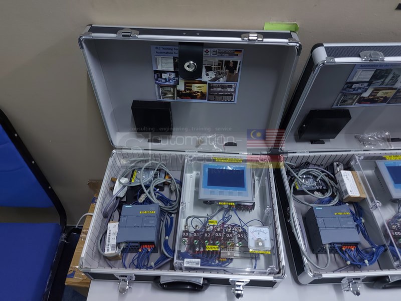 Custom PLC training kit built by ASASMY — wired trainer panel